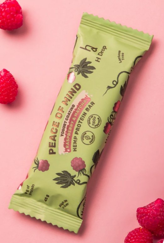 "Peace of Mind" kanapių proteino batonėliai su avietėmis ir mača, jogurtiniame glaiste 'H Drop' (45g)