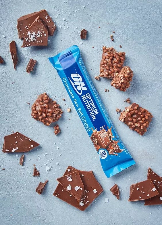 “Chocolate Sea Salt Crunch” Proteininis Batonėlis ‘Optimum Nutrition’ (55g)