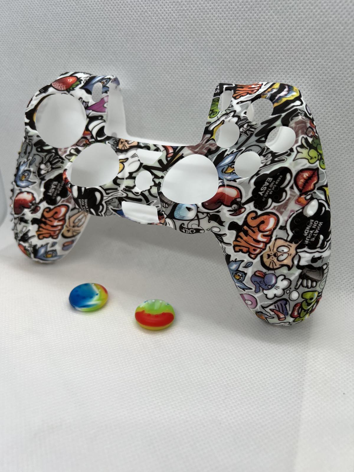 Silikoninė apsauga PS4 pulteliui su spurgeliais
