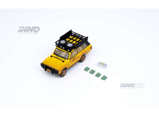 Inno64 Modeliukas 1/64 1982 Range Rover *Camel Trophy* with 1 Tool Box & 4 Fuel Tanks on the Rood Rack included, camel yellow with after race dirt effects.