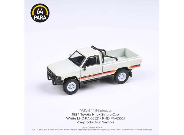PRE-ORD3R Para64 Modeliukas 1/64 1984 Toyota Hilux Single Cab, white left hand drive (cars in a deluxe Acrylic window box)