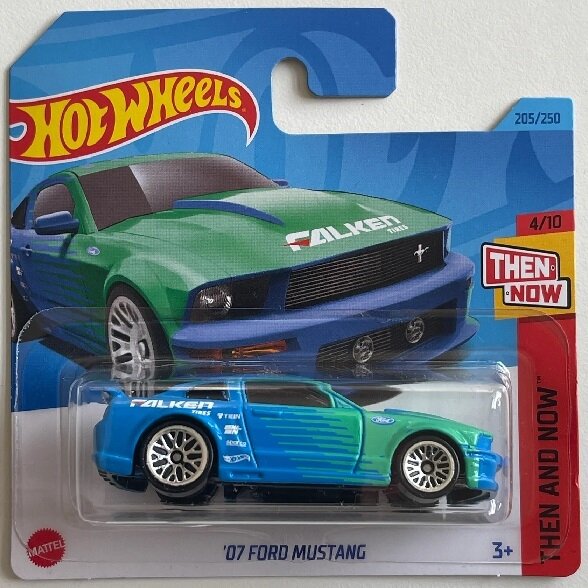 Hot Wheels Mainline Modeliukas 07 Ford Mustang Falken blue/green (yra Sandėlyje)
