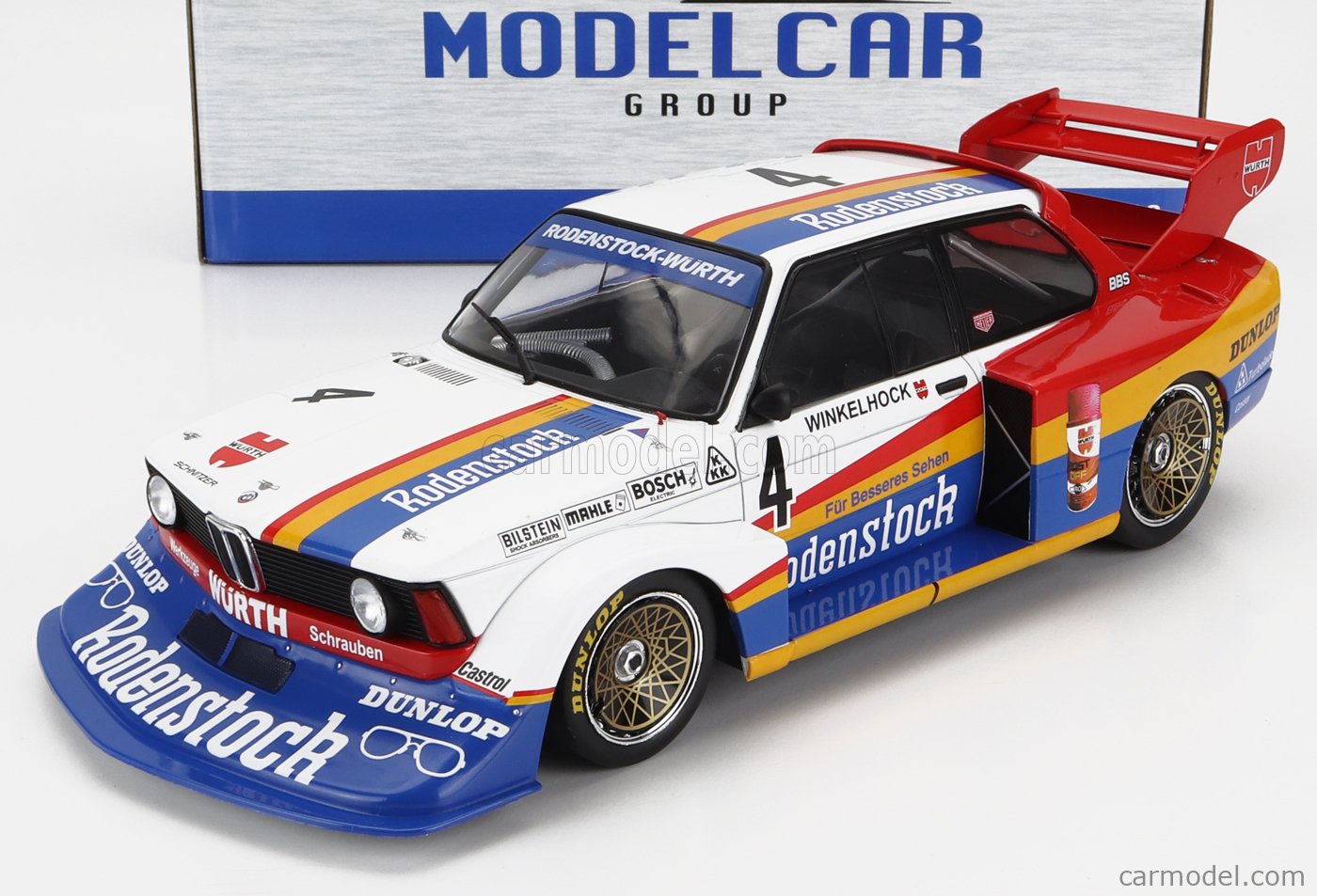PRE-ORD3R MCG Modeliukas 1/18 1979 BMW 320 Gr.5 Rodenstock #4 M. Winkelhock DRM Zolder, white/red/yellow/blue